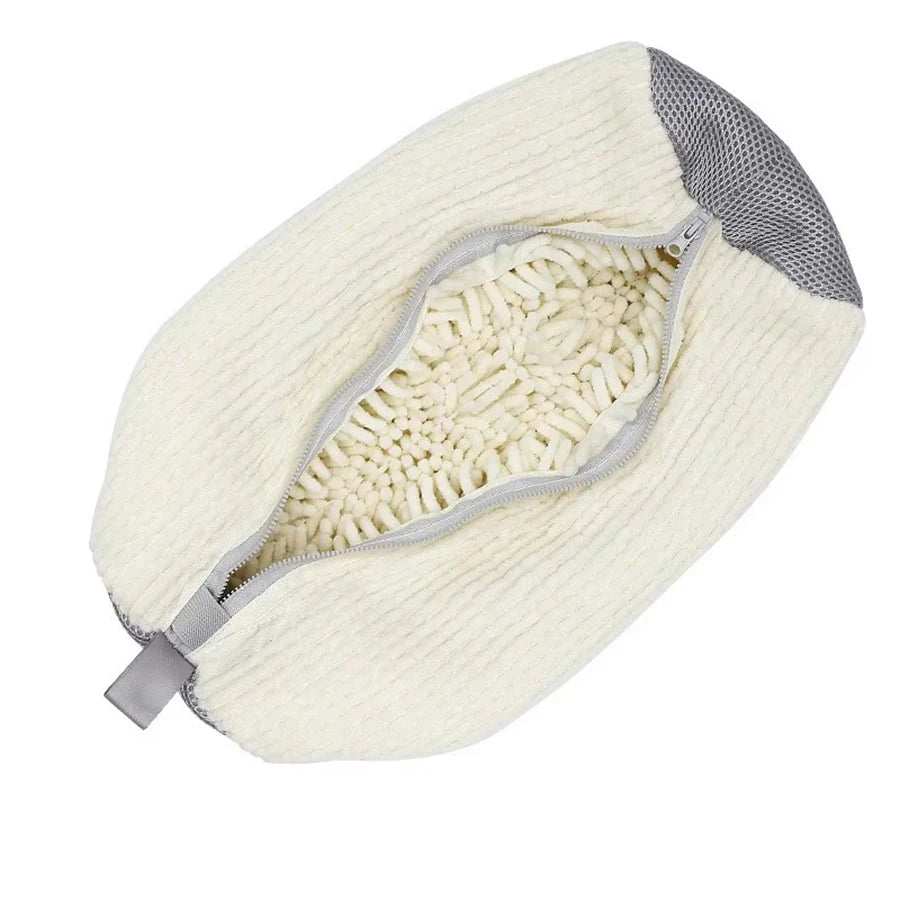 White PairRevive wash bag unzipped to show the dense chenille fibre lining and grey mesh end panel